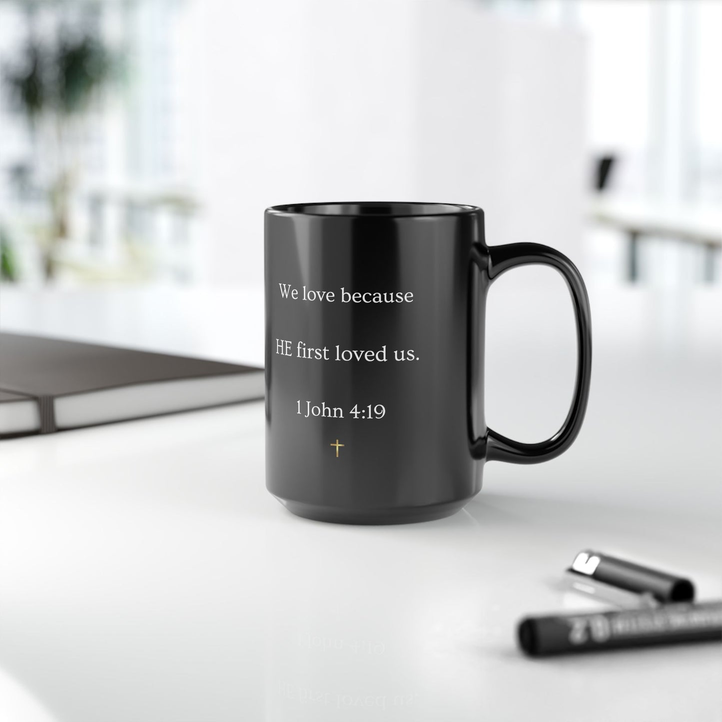 Christian Verse Black Mug - "We love because HE first loved us." (1 John 4:19)